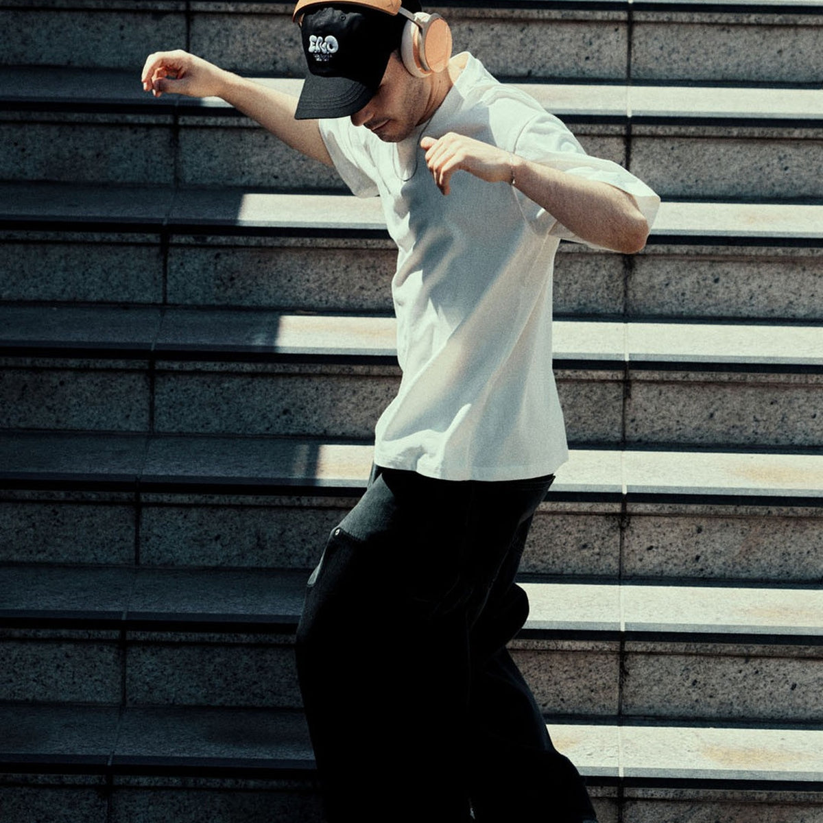 Beyerdynamic Aventho Y in Peach Blush worn outdoors