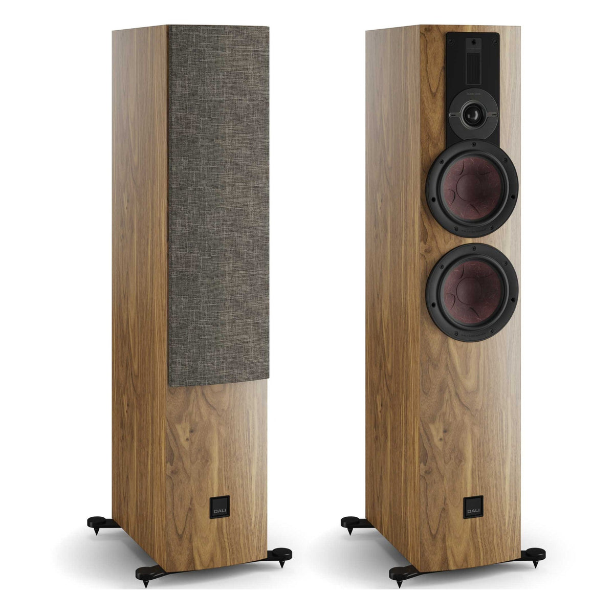 Pair of DALI Rubikore 6 passive floorstanding speakers in walnut finish, showcasing sleek design and wood grain texture.