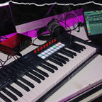 Novation FLkey 2 49 MIDI keyboard with 49 keys, showing its sleek design and control surface in a lifestyle setting.