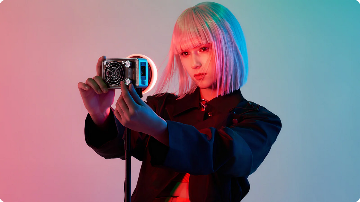 Zhiyun Molus X60 RGB Pro light showing adjustable color spectrum and bright LED panel for professional photography and videography.